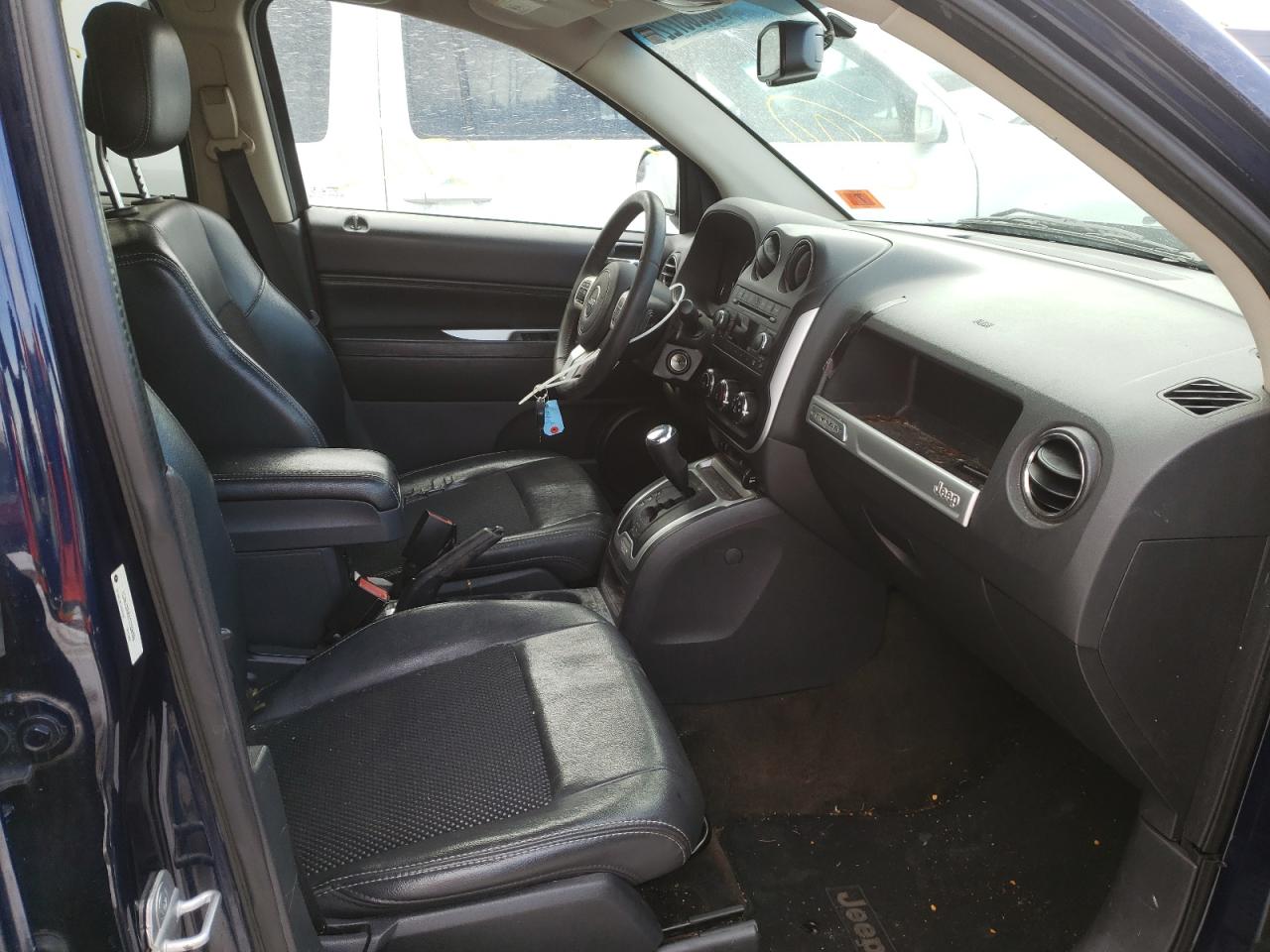 Photo 5 from auction – 2014 JEEP COMPASS LA with VIN 1C4NJDEBXED506990