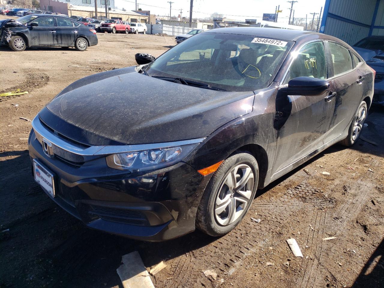 Photo 2 from auction – 2018 HONDA CIVIC LX with VIN 19XFC2F57JE040682