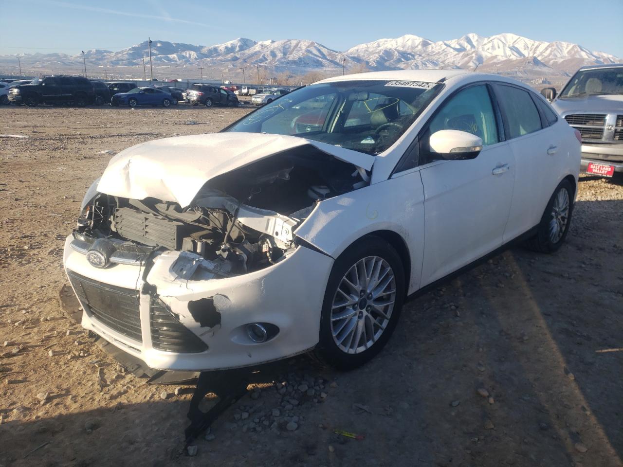 Photo 2 from auction – 2014 FORD FOCUS TITA with VIN 1FADP3J29EL229898