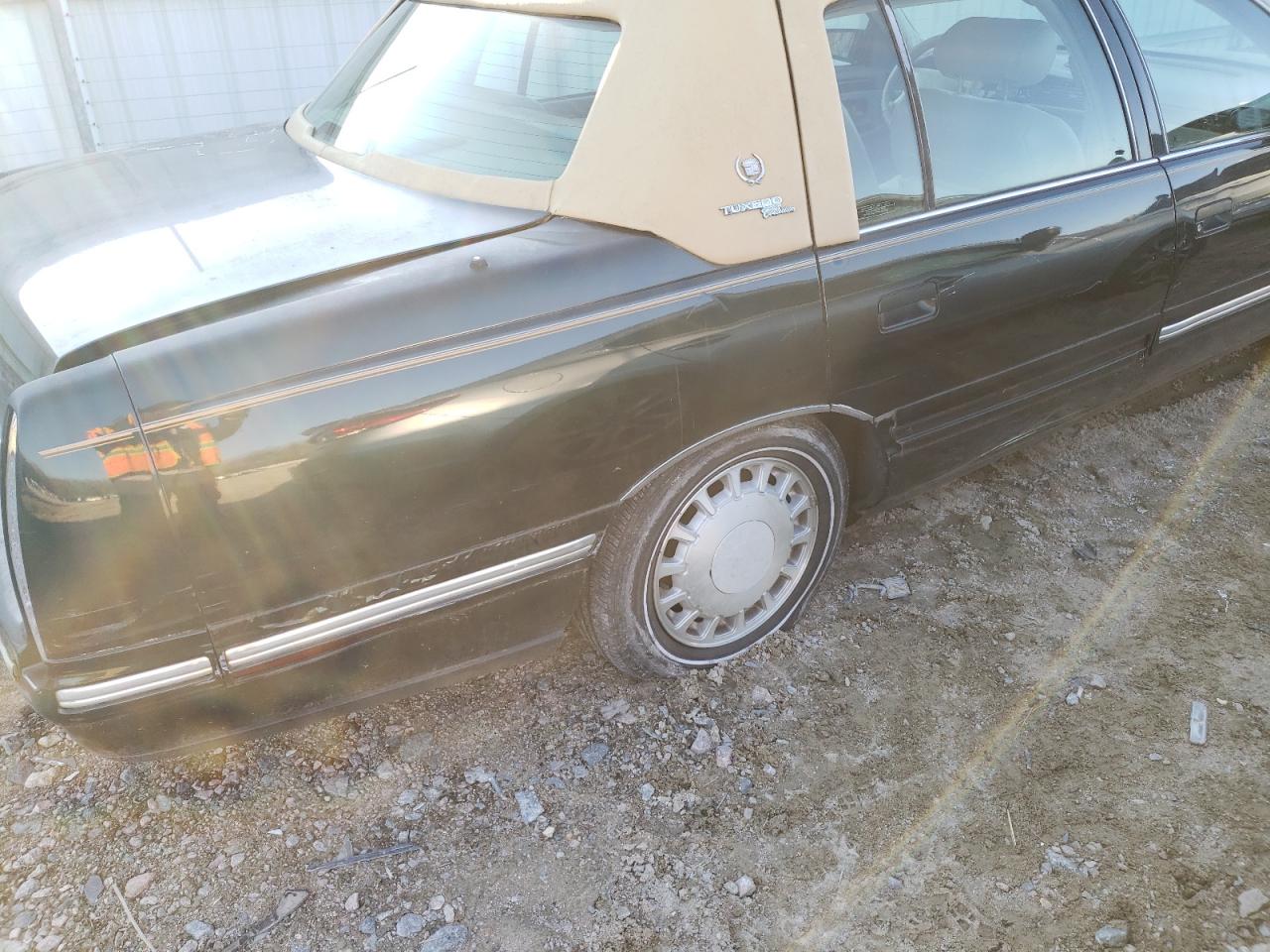 Photo 9 from auction – 1998 CADILLAC DEVILLE with VIN 1G6KD54Y2WU754726
