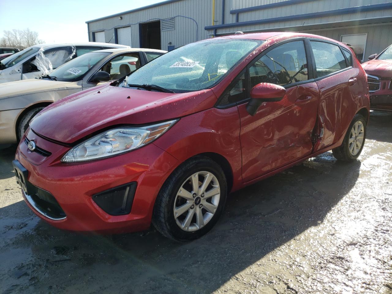Photo 2 from auction – 2011 FORD FIESTA with VIN 3FADP4EJXBM209788