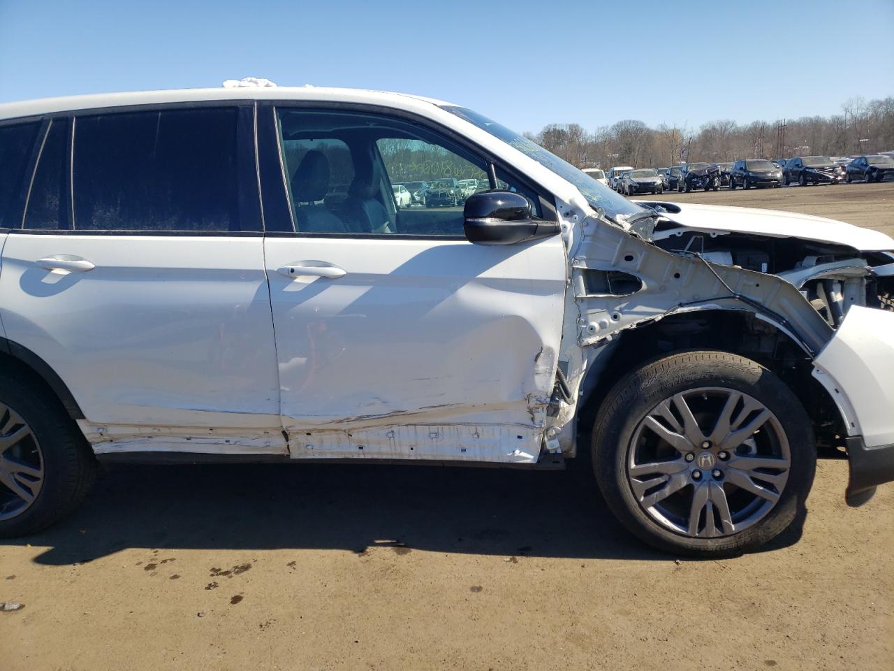 Photo 9 from auction – 2021 HONDA PASSPORT E with VIN 5FNYF8H50MB006811