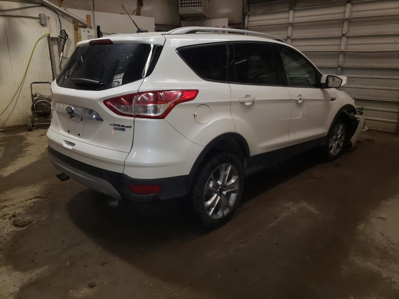 Photo 4 from auction – 2014 FORD ESCAPE TIT with VIN 1FMCU9J9XEUD99658