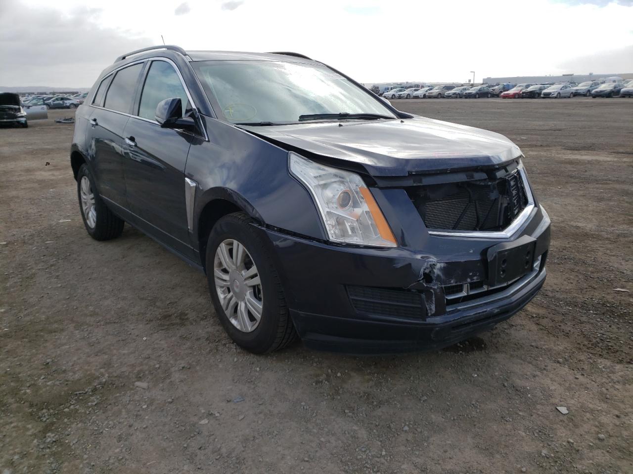CADILLAC SRX 2015 with VIN 3GYFNAE39FS621561 - Photo from auction