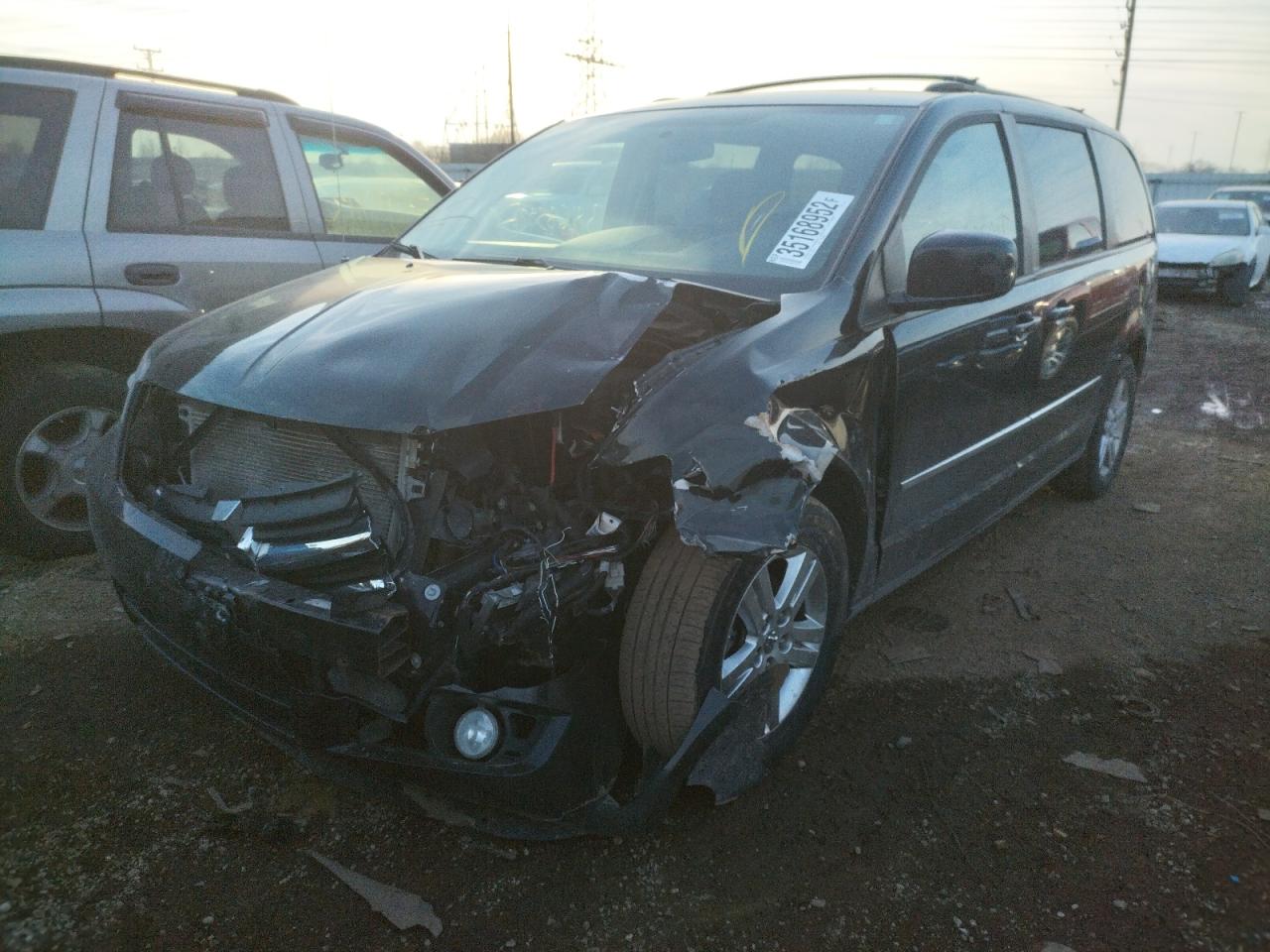 Photo 2 from auction – 2010 DODGE GRAND CARA with VIN 2D4RN6DXXAR440465