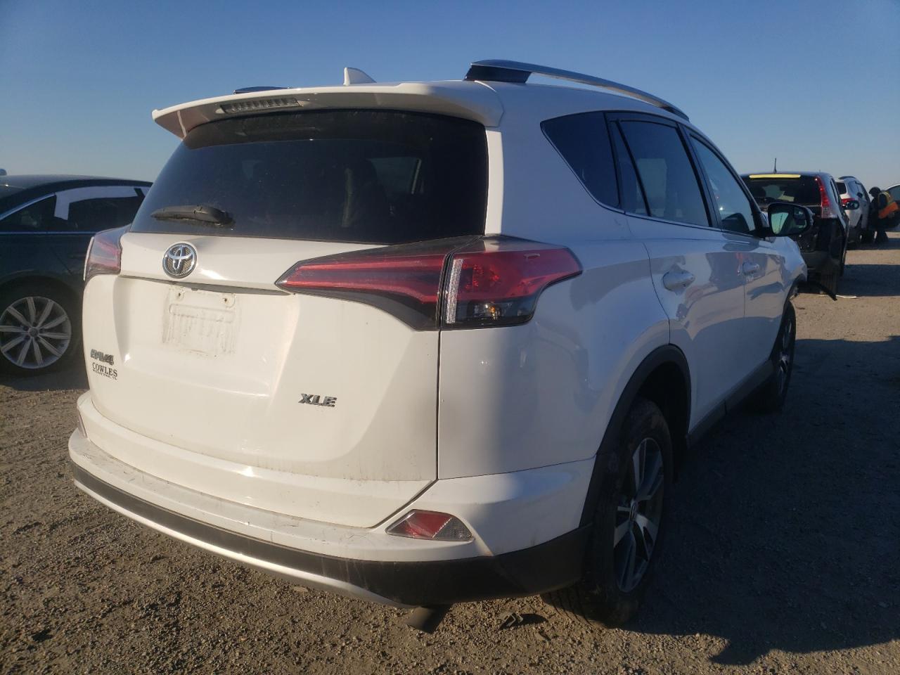 Photo 4 from auction – 2016 TOYOTA RAV4 XLE with VIN 2T3WFREV0GW253553