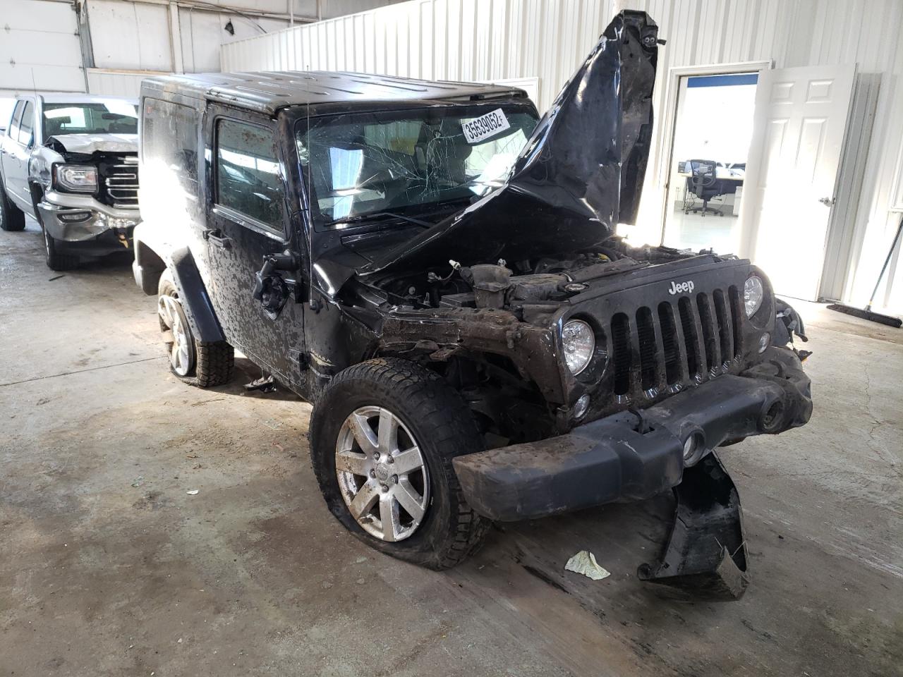 JEEP WRANGLER S 2015 with VIN 1C4AJWBGXFL705197 - Photo from auction