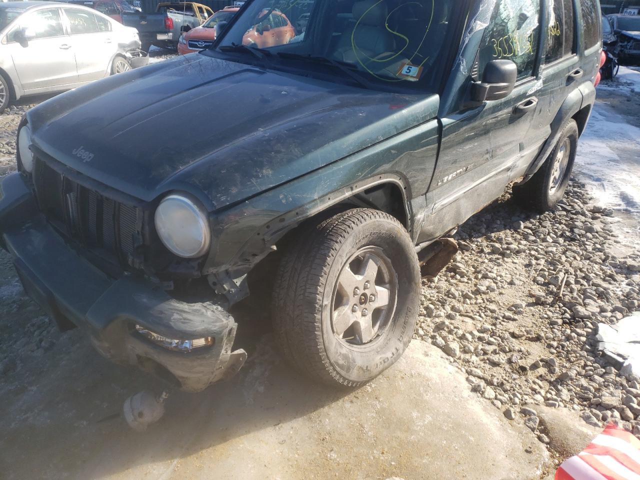 Photo 9 from auction – 2002 JEEP LIBERTY LI with VIN 1J8GL58K32W147334
