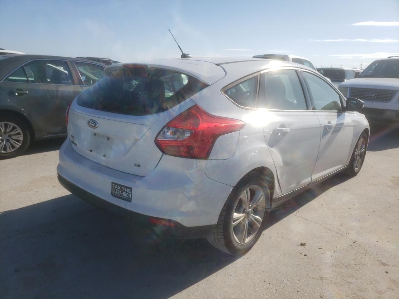 Photo 4 from auction – 2014 FORD FOCUS SE with VIN 1FADP3K22EL319439