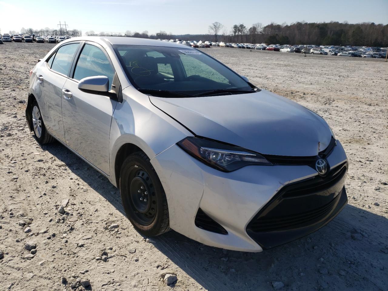 TOYOTA COROLLA L 2017 with VIN 5YFBURHE3HP701697 - Photo from auction