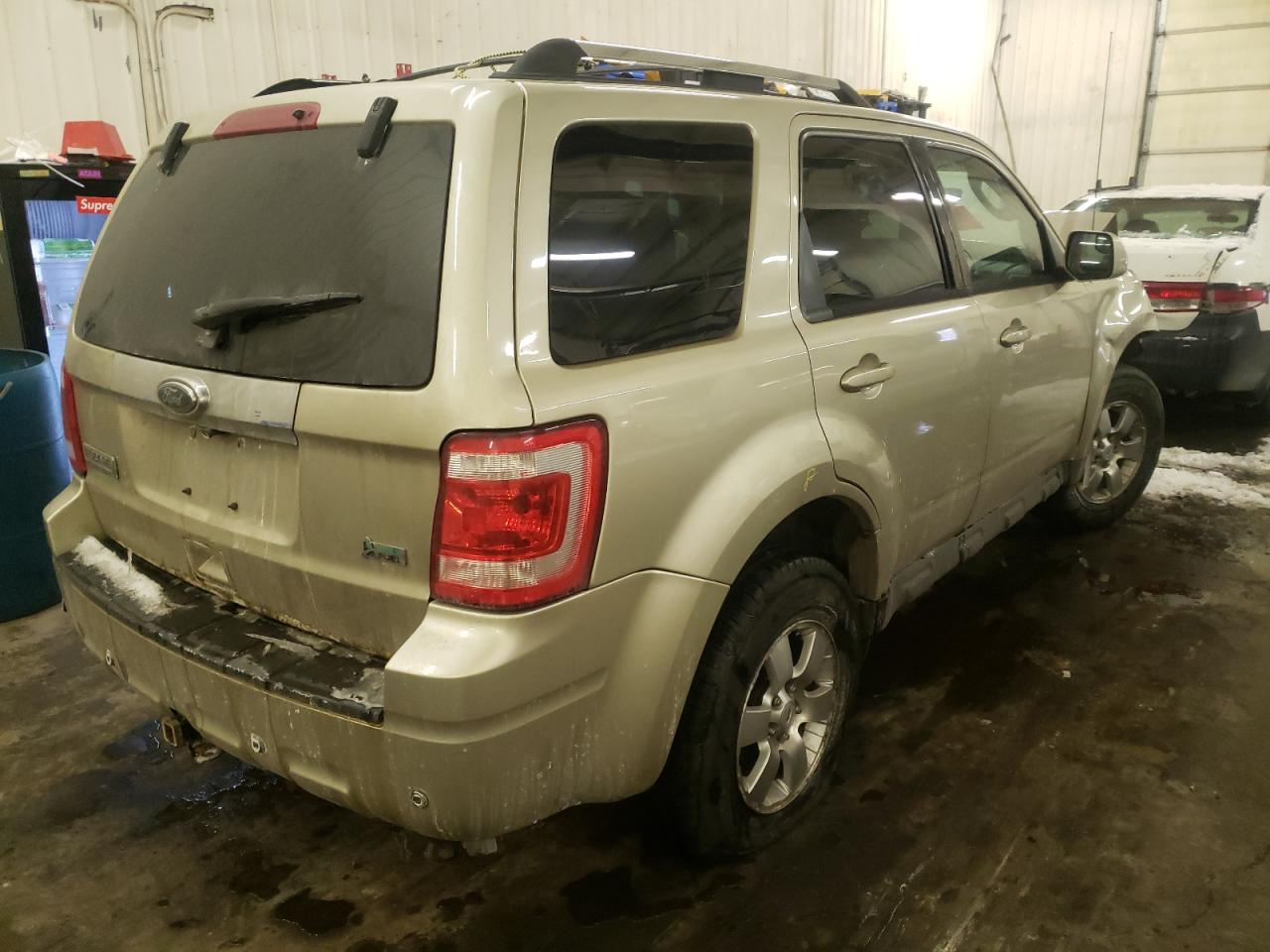 Photo 4 from auction – 2010 FORD ESCAPE LIM with VIN 1FMCU9EG6AKC83467