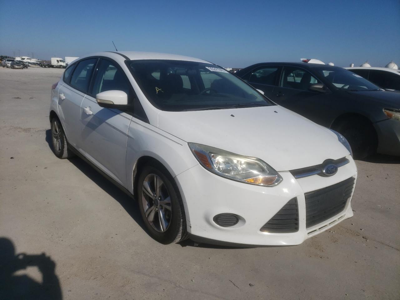 FORD FOCUS SE 2014 with VIN 1FADP3K22EL319439 - Photo from auction
