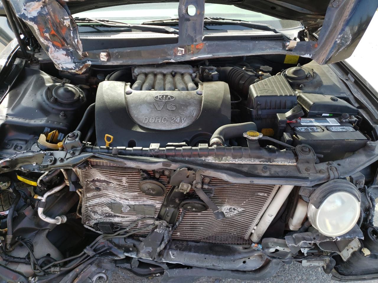 Photo 7 from auction – 2006 KIA OPTIMA LX with VIN KNAGD128865456557