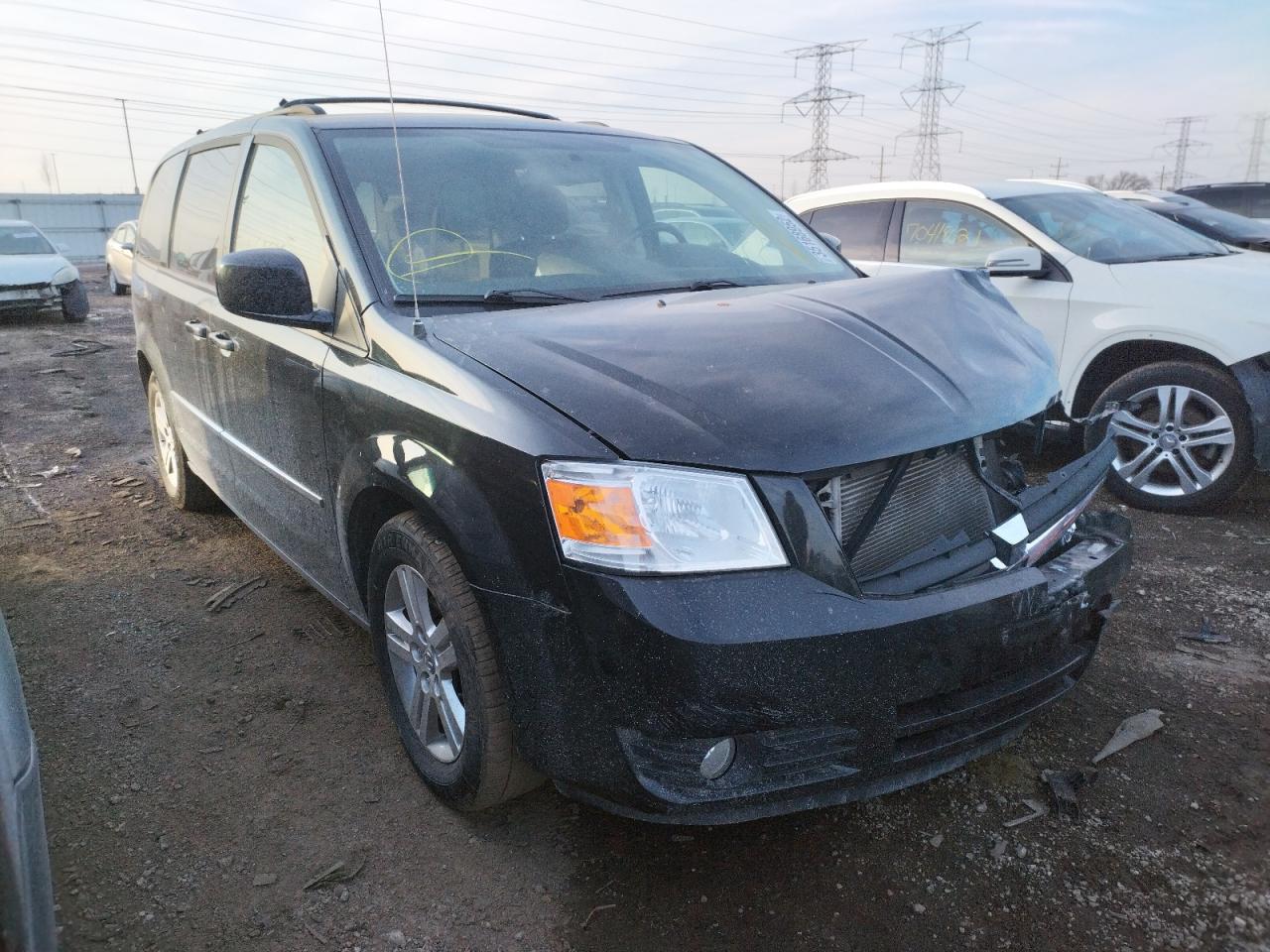 DODGE GRAND CARA 2010 with VIN 2D4RN6DXXAR440465 - Photo from auction