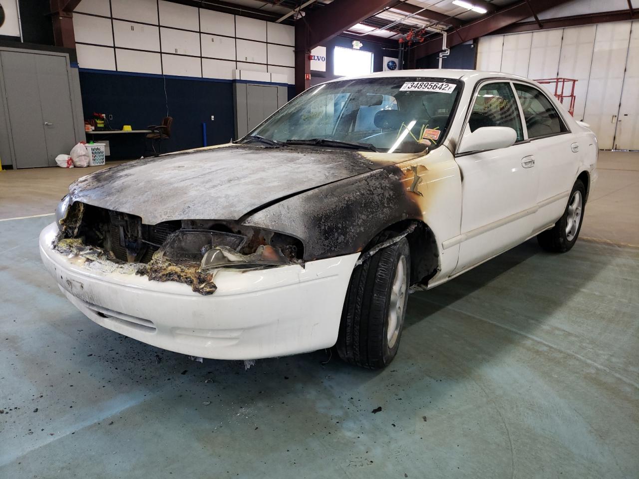 Photo 2 from auction – 2002 MAZDA 626 LX with VIN 1YVGF22C025260172