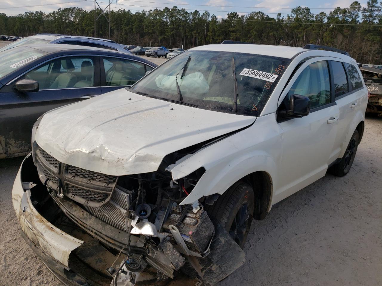 Photo 2 from auction – 2019 DODGE JOURNEY SE with VIN 3C4PDCBB9KT863808