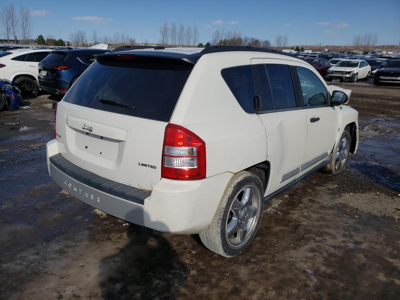 Photo 4 from auction – 2009 JEEP COMPASS LI with VIN 1J4FF57B49D230900