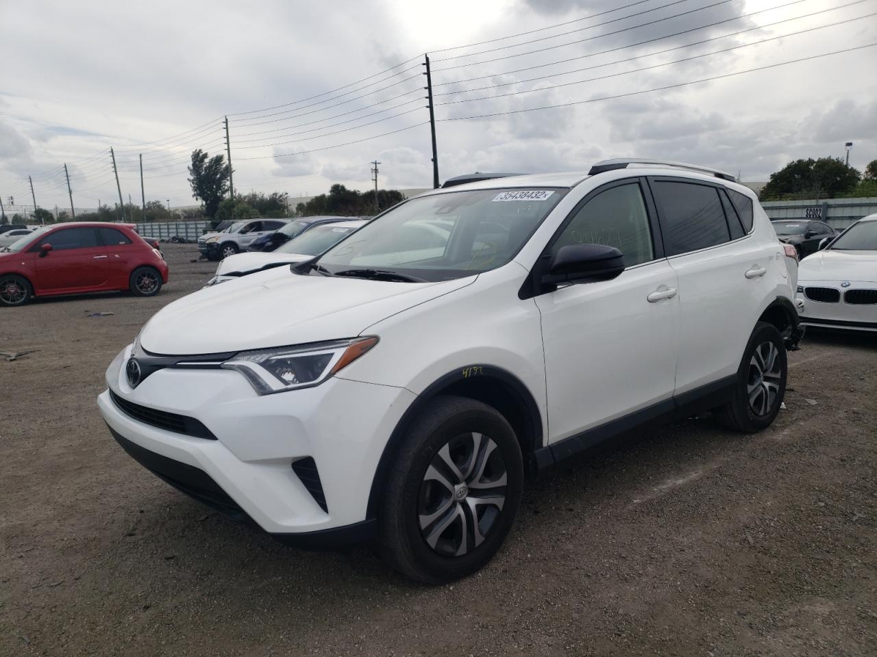 Photo 2 from auction – 2017 TOYOTA RAV4 LE with VIN JTMZFREVXHJ136544