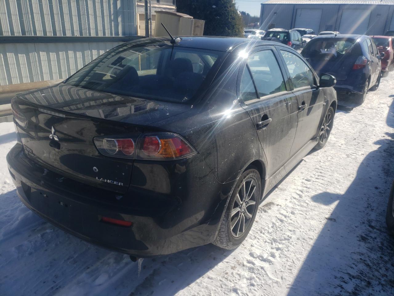 Photo 4 from auction – 2015 MITSUBISHI LANCER SE with VIN JA32V2FW8FU019039