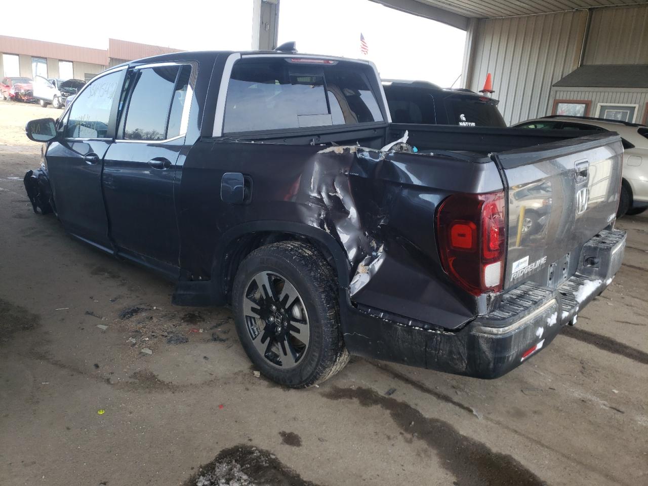 Photo 3 from auction – 2020 HONDA RIDGELINE with VIN 5FPYK3F59LB021640