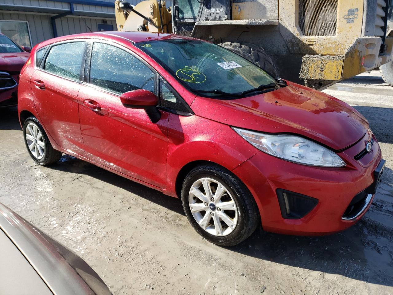 FORD FIESTA 2011 with VIN 3FADP4EJXBM209788 - Photo from auction