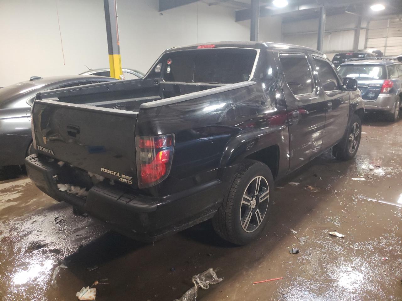 Photo 4 from auction – 2014 HONDA RIDGELINE with VIN 5FPYK1F76EB014864