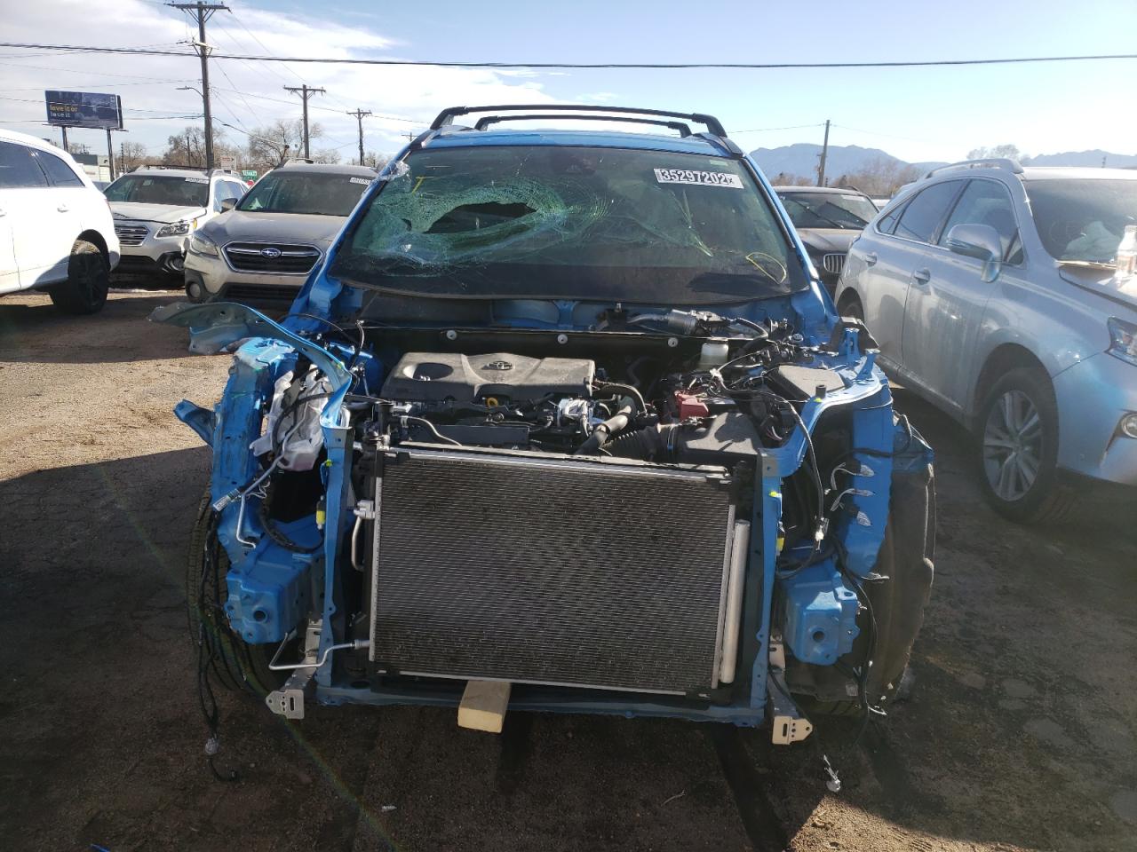 Photo 9 from auction – 2021 TOYOTA RAV4 LE with VIN JTMF1RFV9MD076149