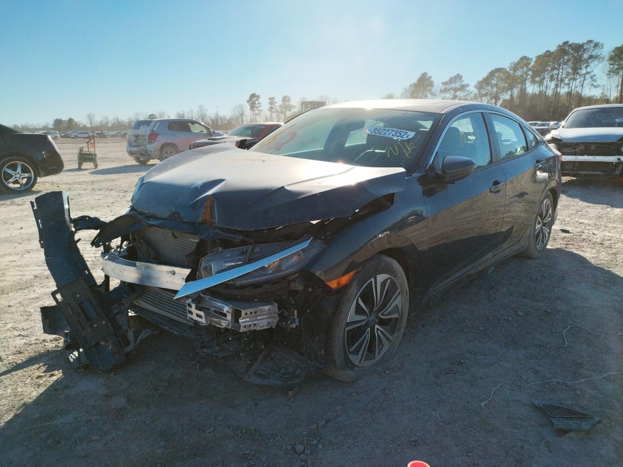 Photo 2 from auction – 2017 HONDA CIVIC EXL with VIN 19XFC1F75HE011932
