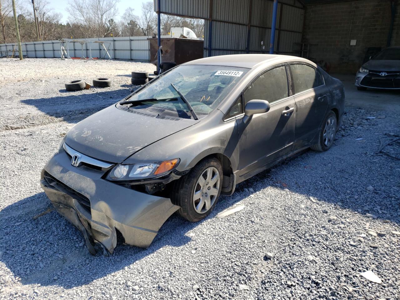 Photo 2 from auction – 2006 HONDA CIVIC LX with VIN JHMFA16526S001310