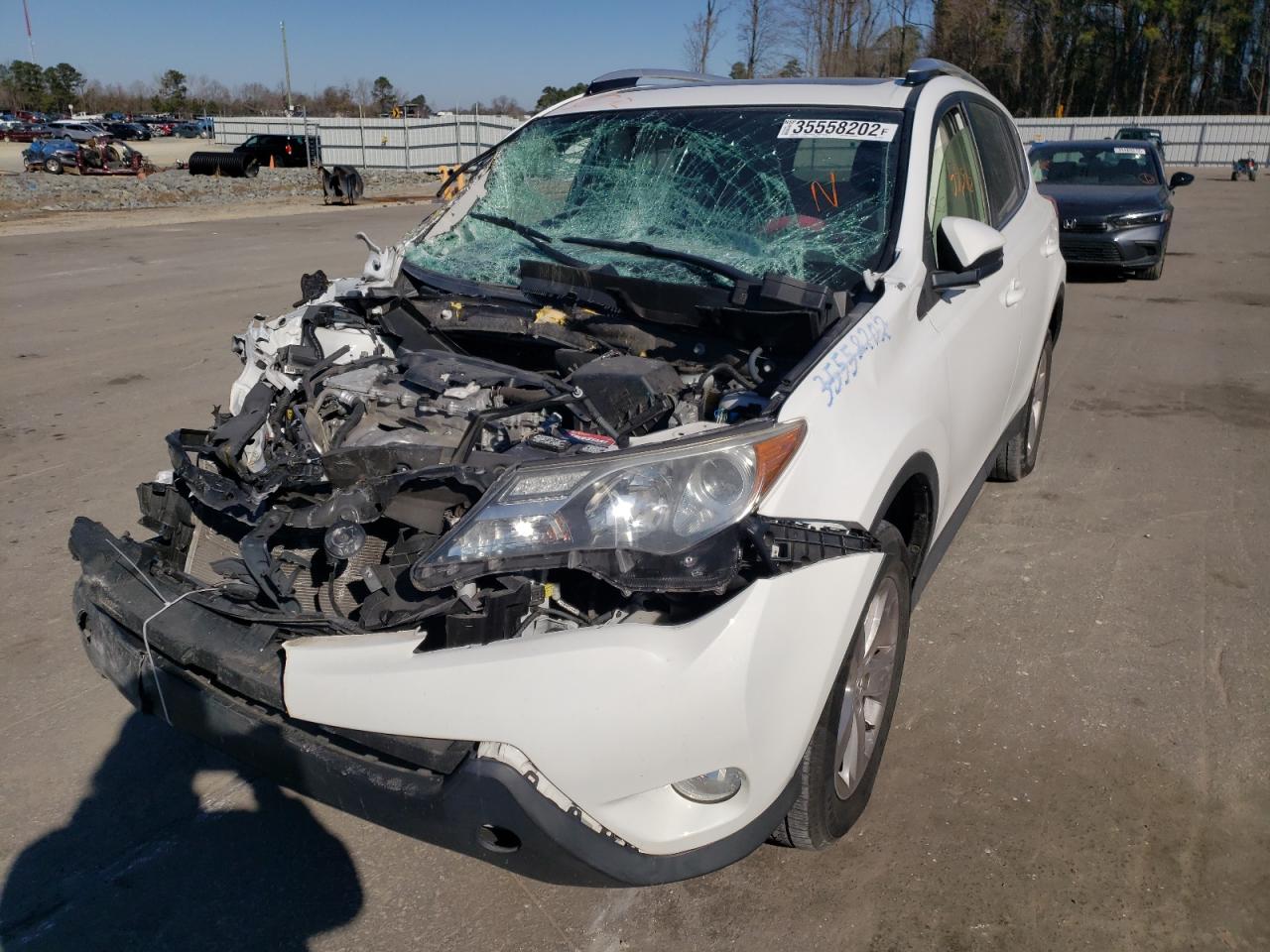 Photo 2 from auction – 2014 TOYOTA RAV4 XLE with VIN JTMWFREV2EJ009902