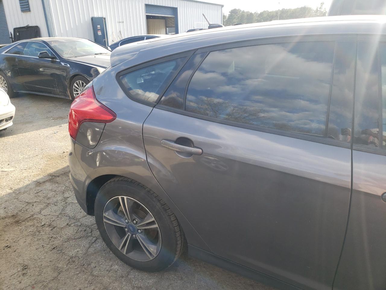 Photo 9 from auction – 2014 FORD FOCUS SE with VIN 1FADP3K21EL432265