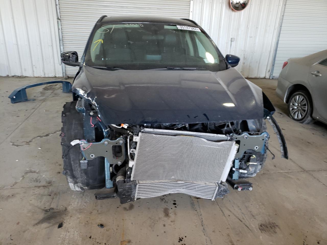Photo 9 from auction – 2020 FORD ESCAPE SEL with VIN 1FMCU9H94LUB54213