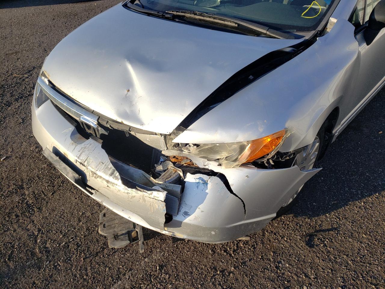 Photo 9 from auction – 2007 HONDA CIVIC DX with VIN 2HGFA16327H030588