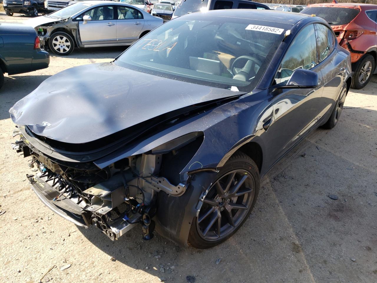 Photo 2 from auction – 2021 TESLA MODEL 3 with VIN 5YJ3E1EB4MF059459
