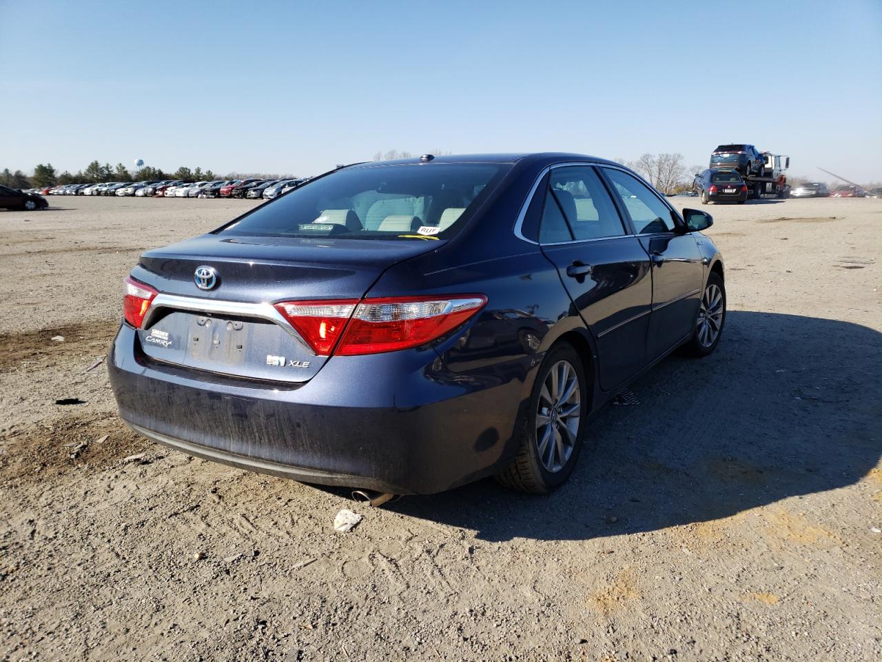 Photo 4 from auction – 2016 TOYOTA CAMRY HYBR with VIN 4T1BD1FK5GU191098
