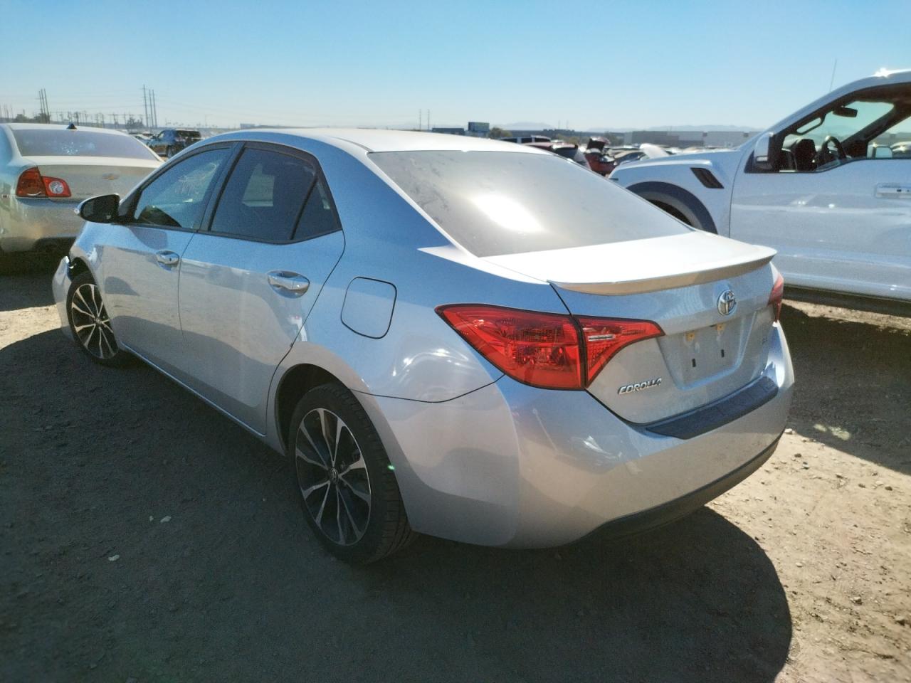 Photo 3 from auction – 2017 TOYOTA COROLLA L with VIN 5YFBURHE9HP682332