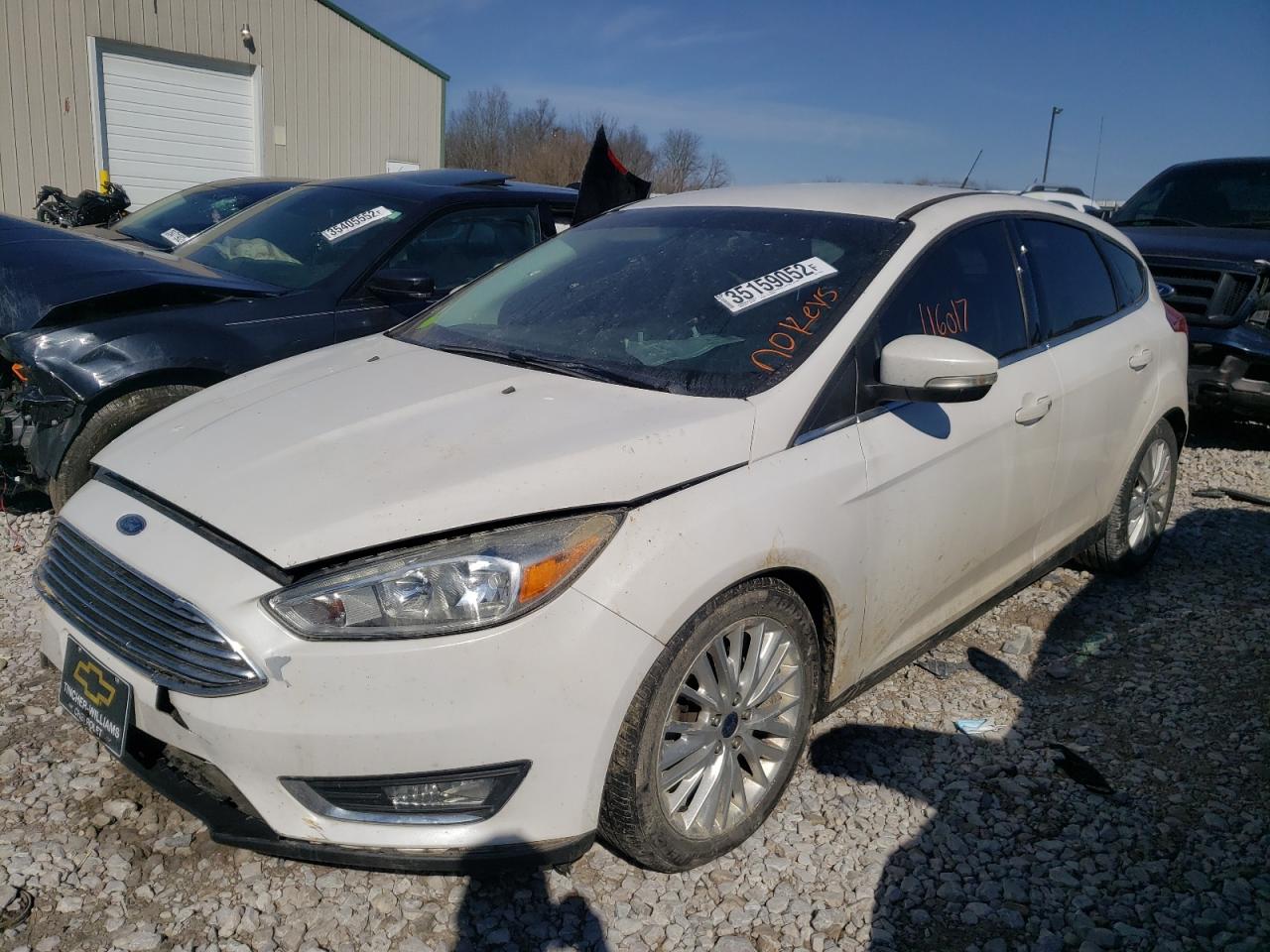 Photo 2 from auction – 2016 FORD FOCUS TITA with VIN 1FADP3N26GL307938
