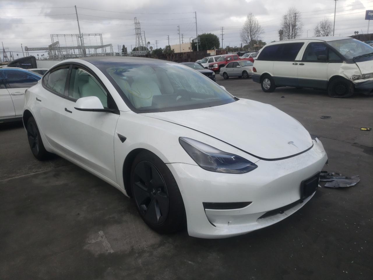 TESLA MODEL 3 2021 with VIN 5YJ3E1EA4MF987554 - Photo from auction