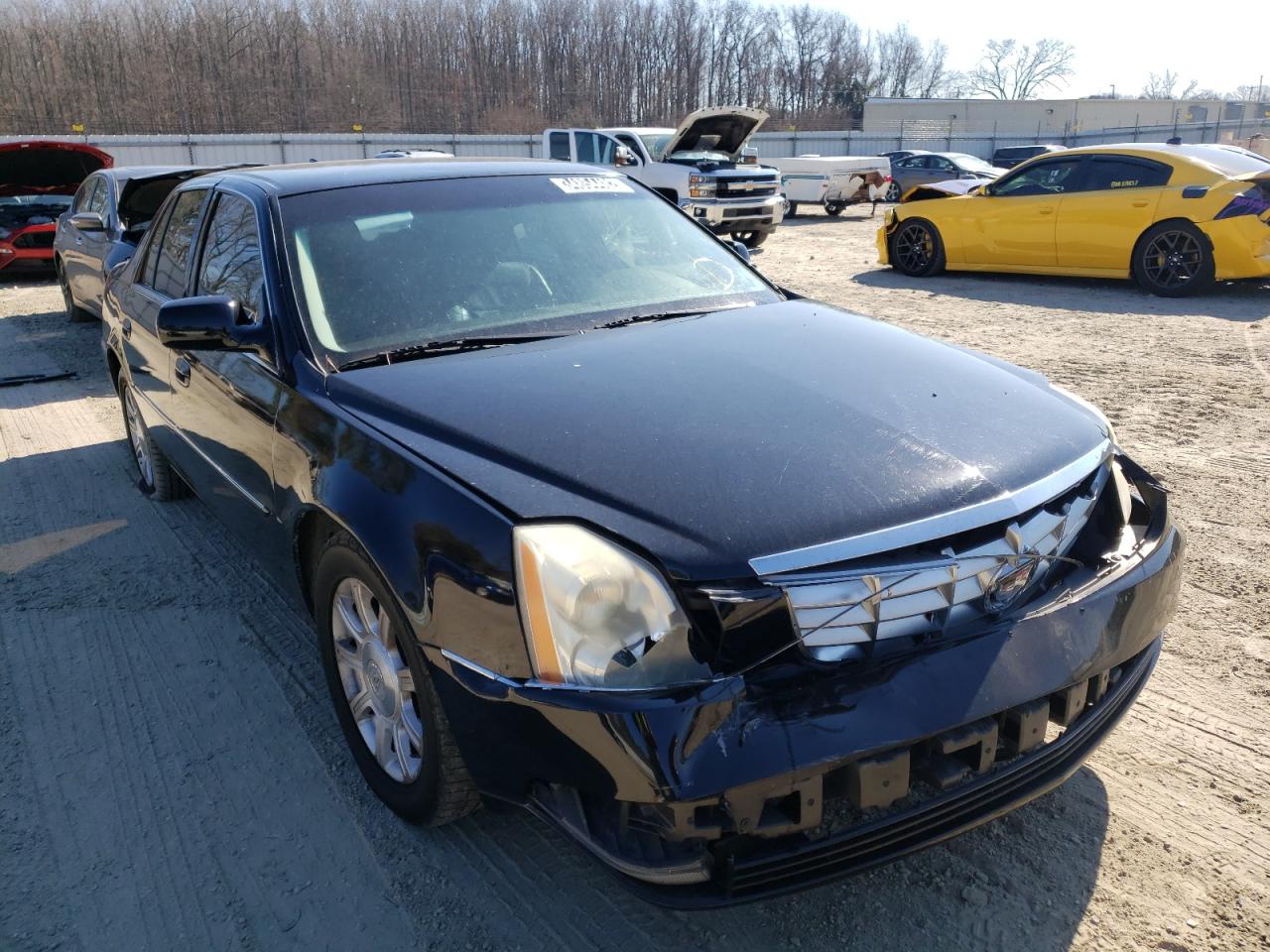 CADILLAC DTS 2010 with VIN 1G6KA5EYXAU124310 - Photo from auction