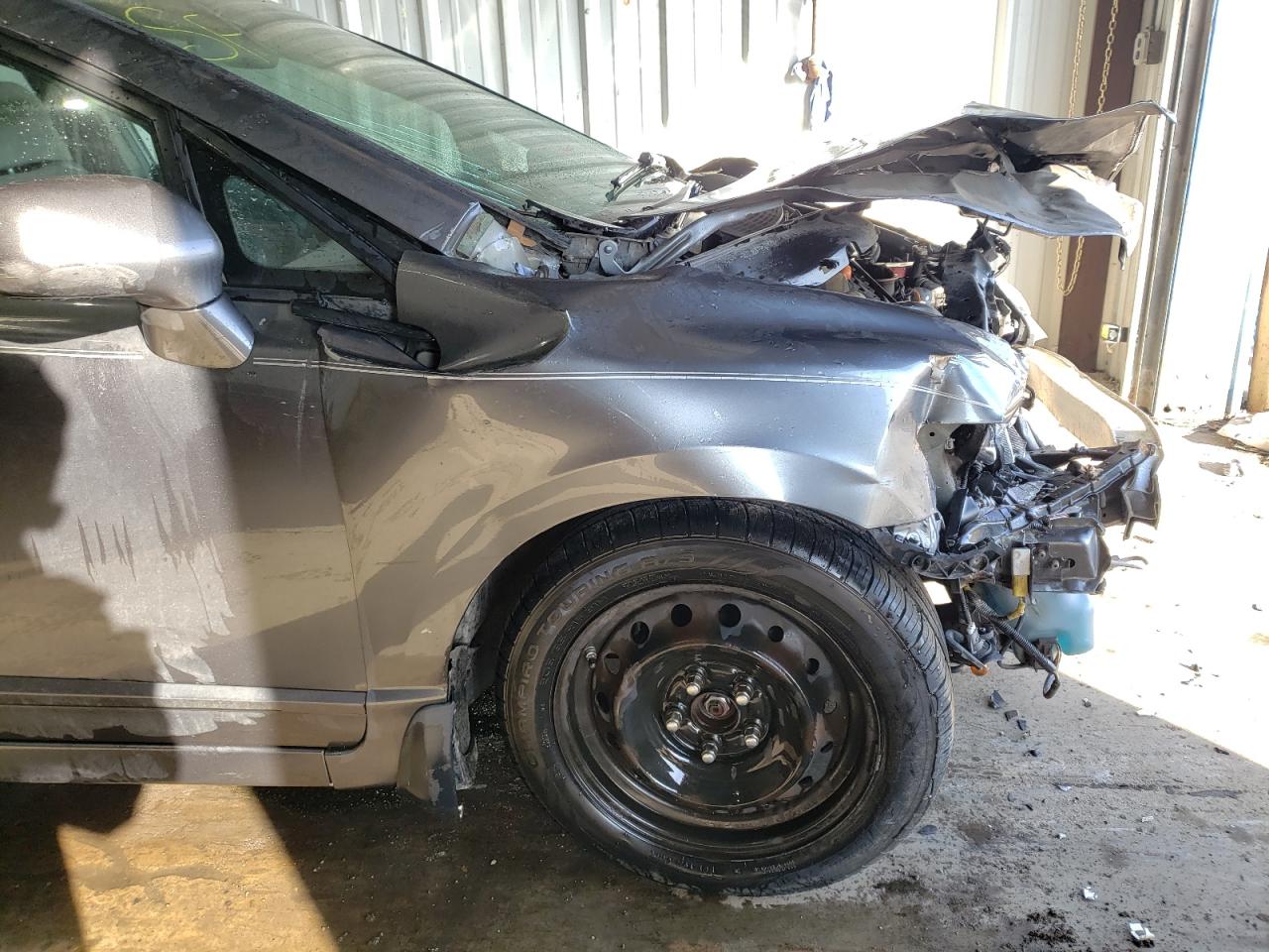Photo 9 from auction – 2011 HONDA CIVIC LX with VIN 19XFA1F52BE011754