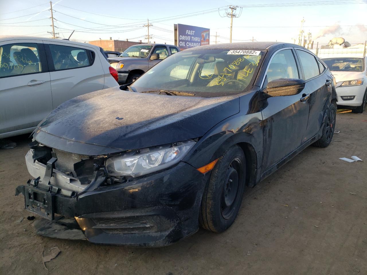 Photo 2 from auction – 2016 HONDA CIVIC LX with VIN 19XFC2F50GE021027