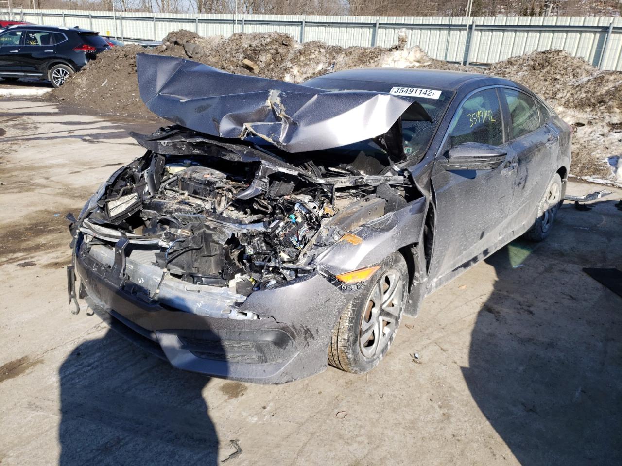 Photo 2 from auction – 2016 HONDA CIVIC LX with VIN 2HGFC2F50GH517080