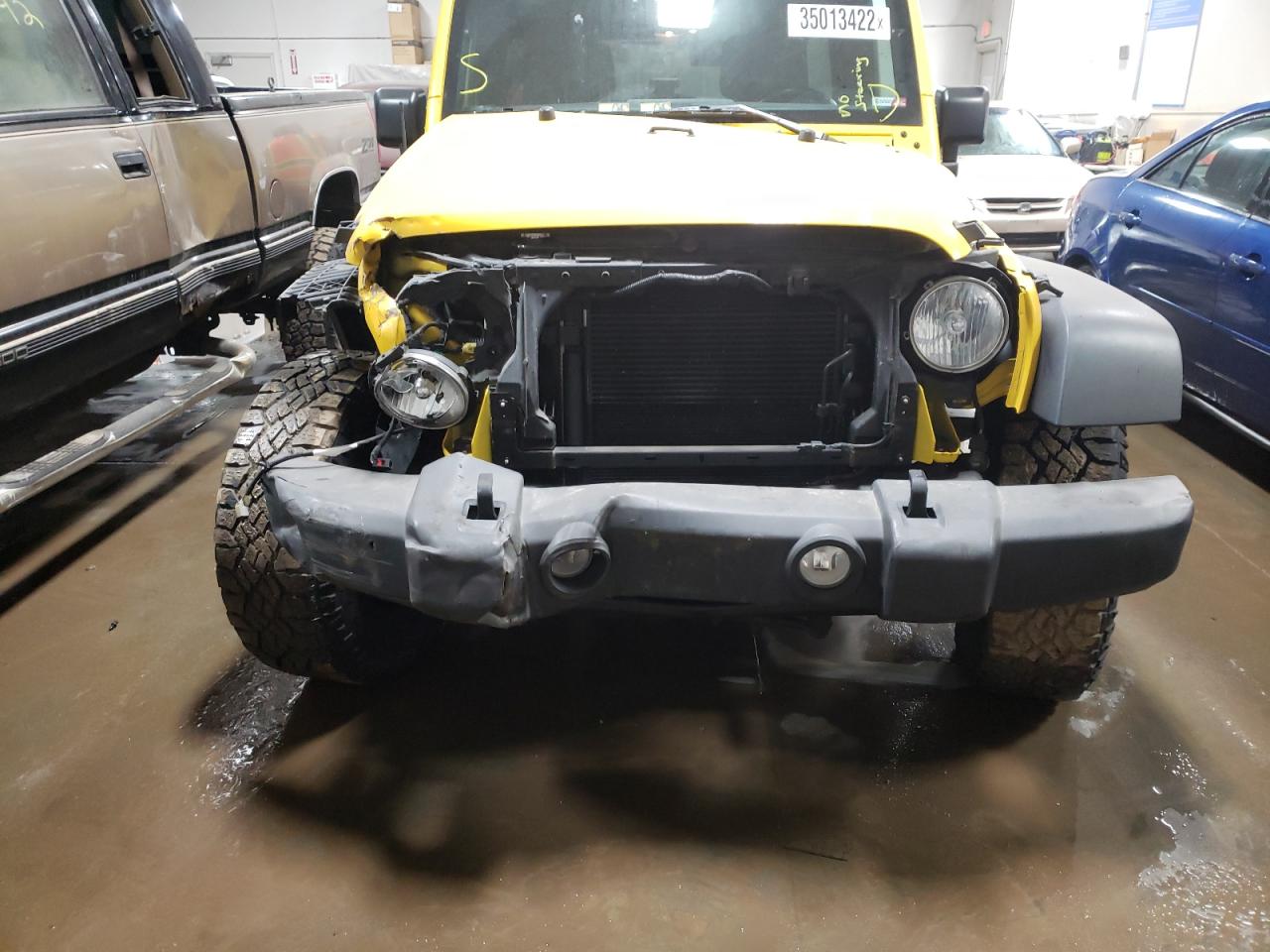 Photo 9 from auction – 2015 JEEP WRANGLER U with VIN 1C4BJWDGXFL602606