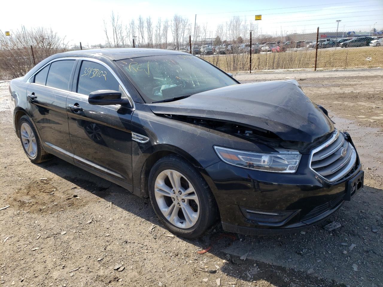 FORD TAURUS SEL 2016 with VIN 1FAHP2E85GG119825 - Photo from auction