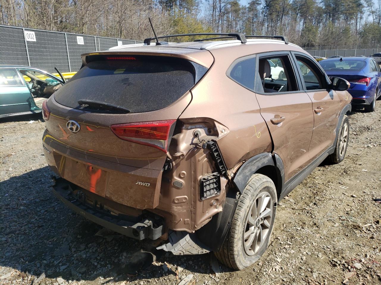 Photo 4 from auction – 2016 HYUNDAI TUCSON LIM with VIN KM8J3CA40GU211616