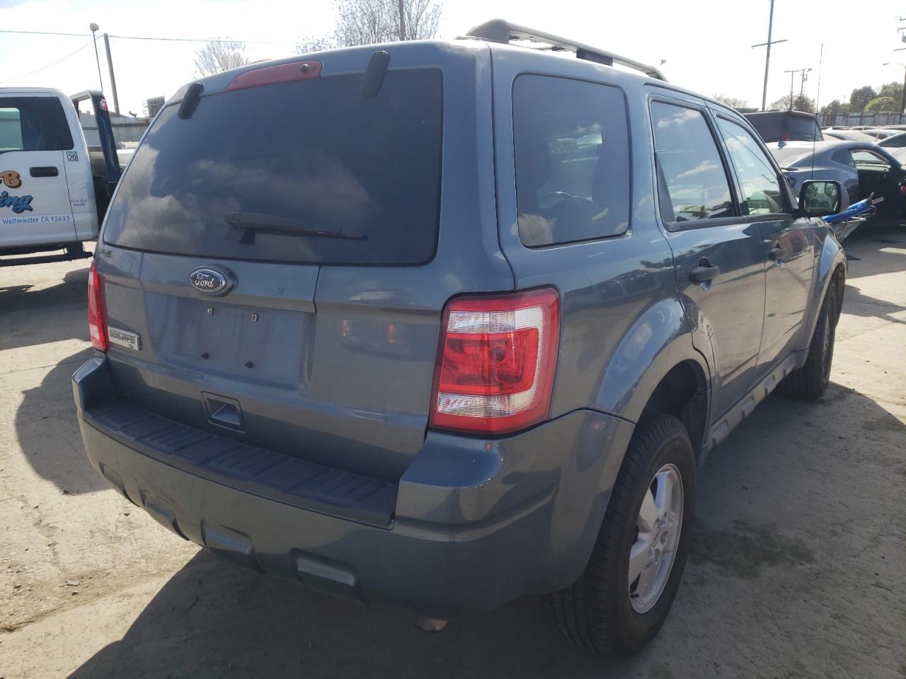 Photo 4 from auction – 2011 FORD ESCAPE XLT with VIN 1FMCU0D72BKA56307