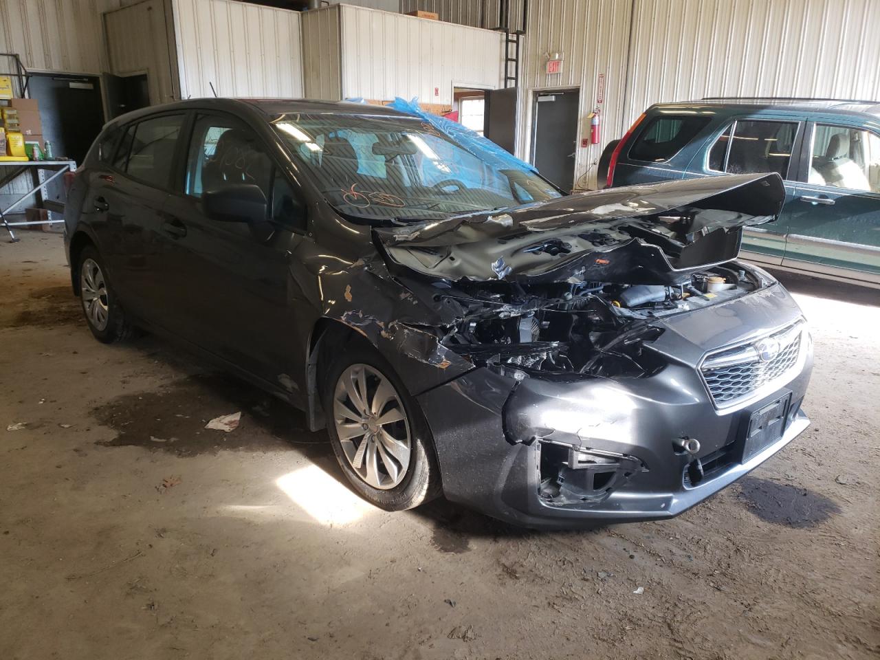 SUBARU IMPREZA 2018 with VIN 4S3GTAA63J1718488 - Photo from auction