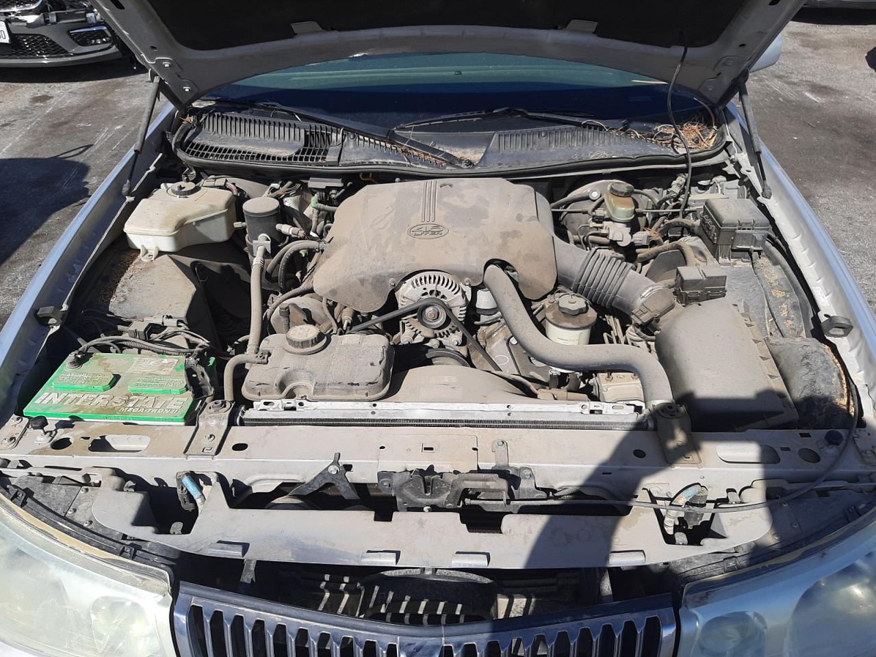 Photo 7 from auction – 2002 LINCOLN TOWN CAR E with VIN 1LNHM81W32Y671560