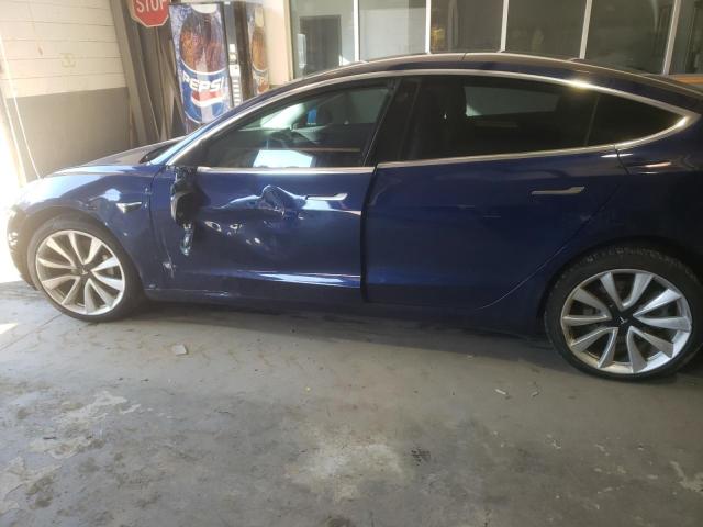 Photo 9 from auction – 2018 TESLA MODEL 3 with VIN 5YJ3E1EB8JF054776