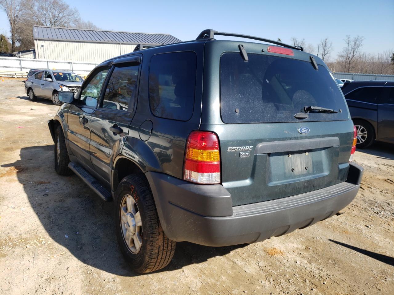 Photo 3 from auction – 2003 FORD ESCAPE XLT with VIN 1FMYU93123KB23500